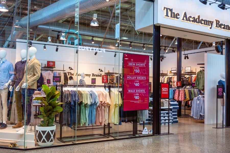 Sustainable fashion brands retail store displaying eco-friendly clothing collections