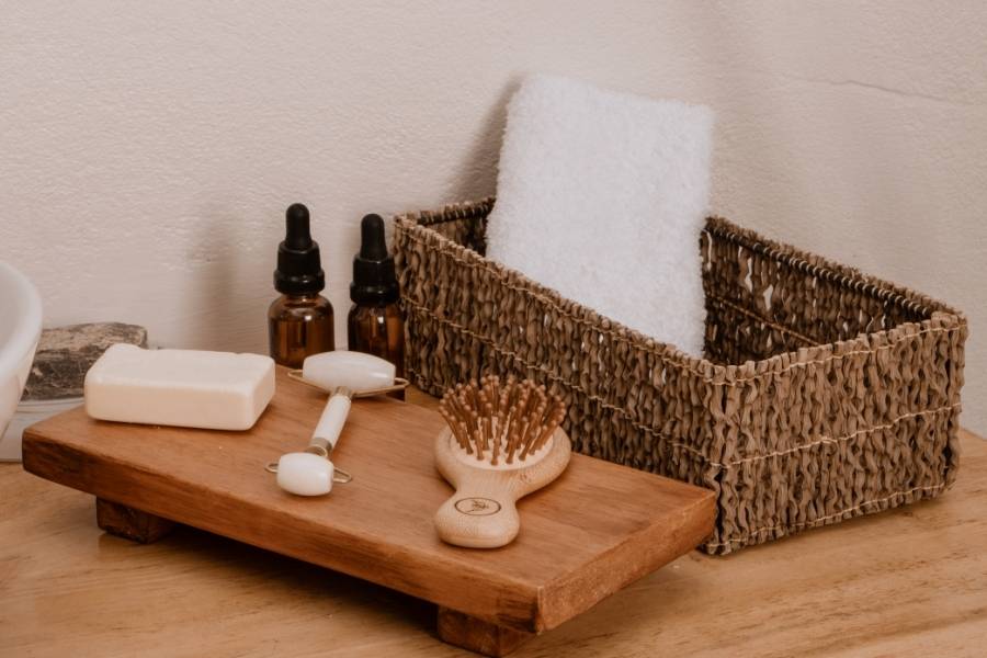 Natural slug life skincare routine setup with organic products and woven basket